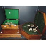 Two canteens containing part sets of silver plated cutlery and a treen box containing loose plated