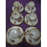 A selection of hand decorated tea cups and saucers by Hammersley