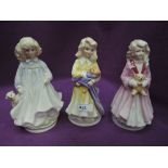 Three Royal Doulton figures modelled as Faith, Hope and Charity, Limited Edition HN3082, 3061 and