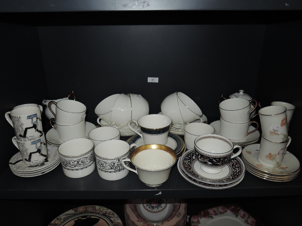 A selection of tea and coffee cups including Royal Doulton and Wedgwood