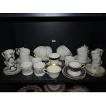 A selection of tea and coffee cups including Royal Doulton and Wedgwood