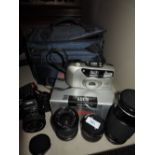 A Pentax Program A camera with Tokina 28mm, 80-200mm, 35-70mm and doubler in soft camera bag
