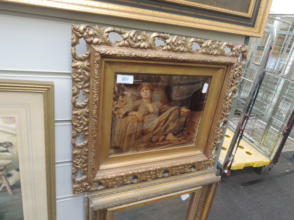 A cyrstoleum of reclining lady in gilt plaster frame