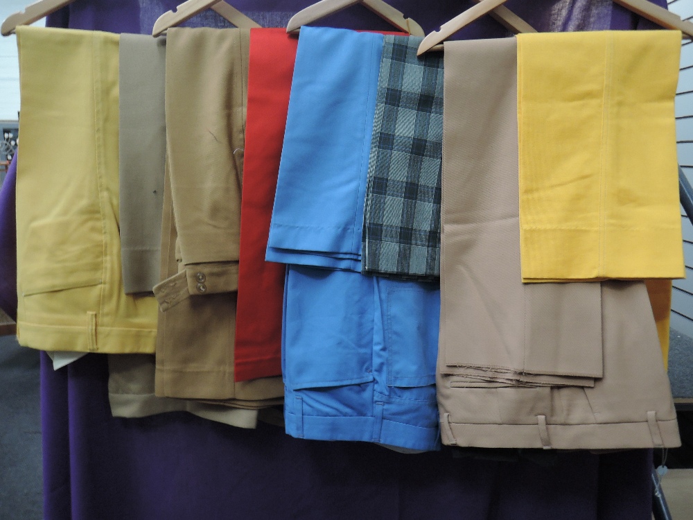 Twelve pairs of gents vintage flared trousers, some vibrant colours and patterns. Includes Jaeger,