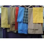 Twelve pairs of gents vintage flared trousers, some vibrant colours and patterns. Includes Jaeger,