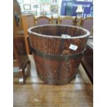 An oak and brass banded bucket container