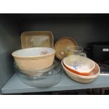 A selection of cookware items including cassarole dishes etc