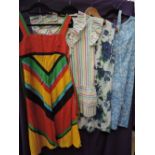 Four vintage cotton dresses/pinafores,lovely bright patterns. good condition, mainly 1960s.