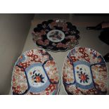 A pair of early 20th century Victorian dishes of Imari design, and a similar scallop charger