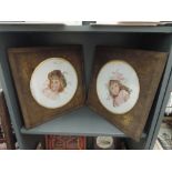 A pair of Victorian porcelain plaques having painted pictorial decoration of young ladies