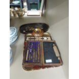 A miscellaneous selection including treen candlestick, geometry set in brass, cribbage, two trays