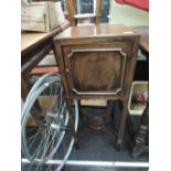 An early 20th century mahogany night cupboard having slender frame