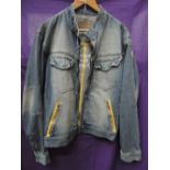 Denim jacket in a large size, having embroidered detailing to back.good condition.