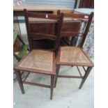 A pair of Edwardian bedroom chairsq