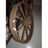 A cast iron cart or similar wheel