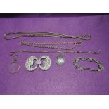 A small selection of jewellery including gold plated chains, pinchbeck eye glass and muff chain.