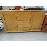 A modern beech effect sideboard