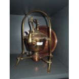 A brass and copper fitment travellers spirit kettle and copper bowl