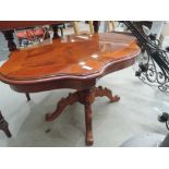 A reproduction veneer topped coffee table