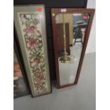 A 60's style teak framed mirror and embroidery