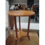 A modern stained frame occasional table