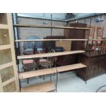 A natural wood and metal frame shelf unit