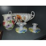 A selection of hand decorated ceramics by Radford