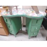 A kidney shaped dressing table with Mr Men/Little Miss decoration