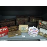 A selection of tins and containers including Halls ink well