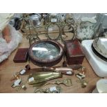 A selection of brass wares and glass fronted biscuit tin