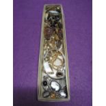 A small selection of costume jewellery including Rotary wrist watches, copper style brooches etc