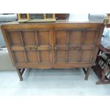 An early 20th Century oak sideboard