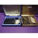 A brass cigarette box and jewellery case containing a small selection of costume jewellery etc