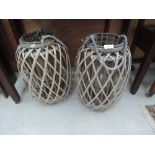 A pair of basket beach lanterns