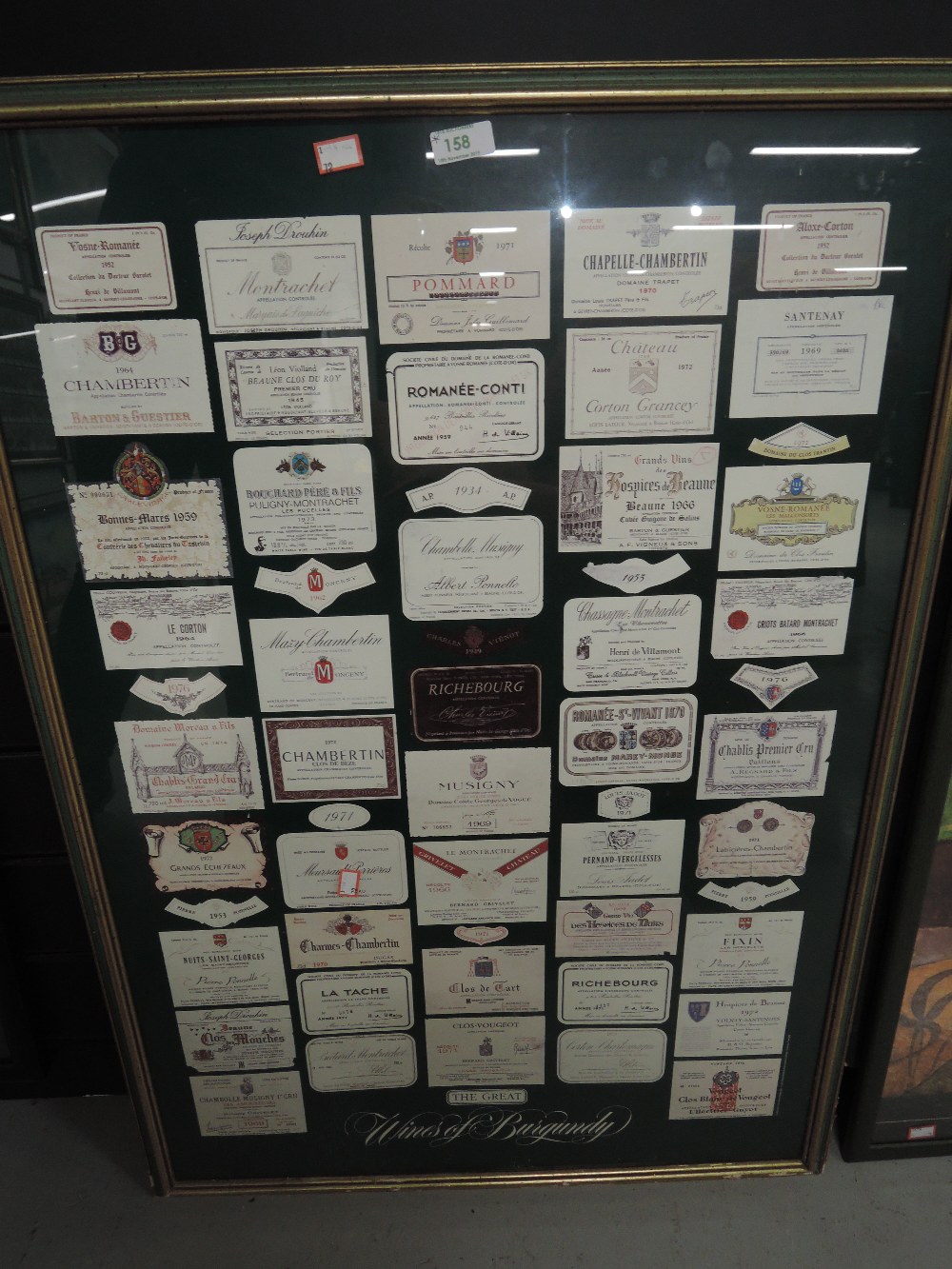 A selection of wine labels framed and glazed