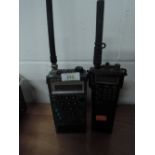 Two walkie talkie style radio sets including Sony and Iwin