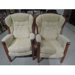 A pair of modern armchairs