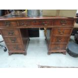 A reproduction Regency style pedestal desk