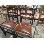 Two oak ladderback dining chairs
