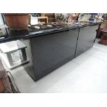 A modern/vintage designer sideboard/cocktail cabinet in black gloss, possubly Verardo retail £2500