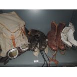 A selection of ice skates including leather bound and similar cycle goggles