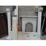 A cast fire place, grate, Adams style surround, stone mantel etc