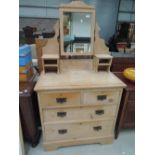 A stripped pine dressing table