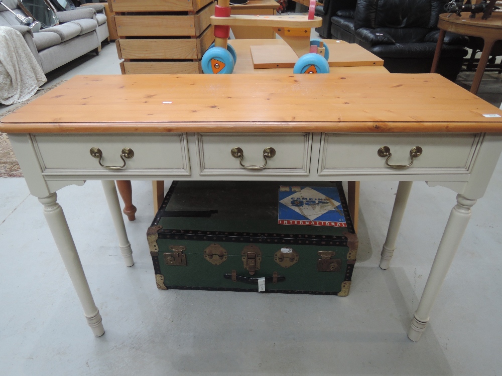 A modern pine top and painted console table