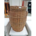 A wicker linen basket