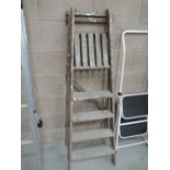 A set of wooden pin ladders