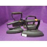 A selection of cast flat irons including T Allen