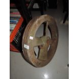 A cast iron heavy set industrial pulley wheel