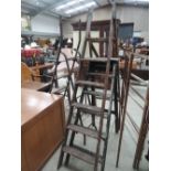 Three sets of vintage step ladders