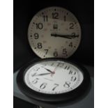 A vintage Gent of London wall clock and similar reversed clock